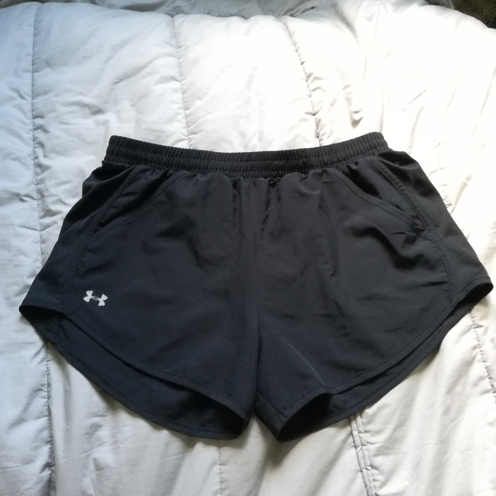 Under Armour running shorts with pockets